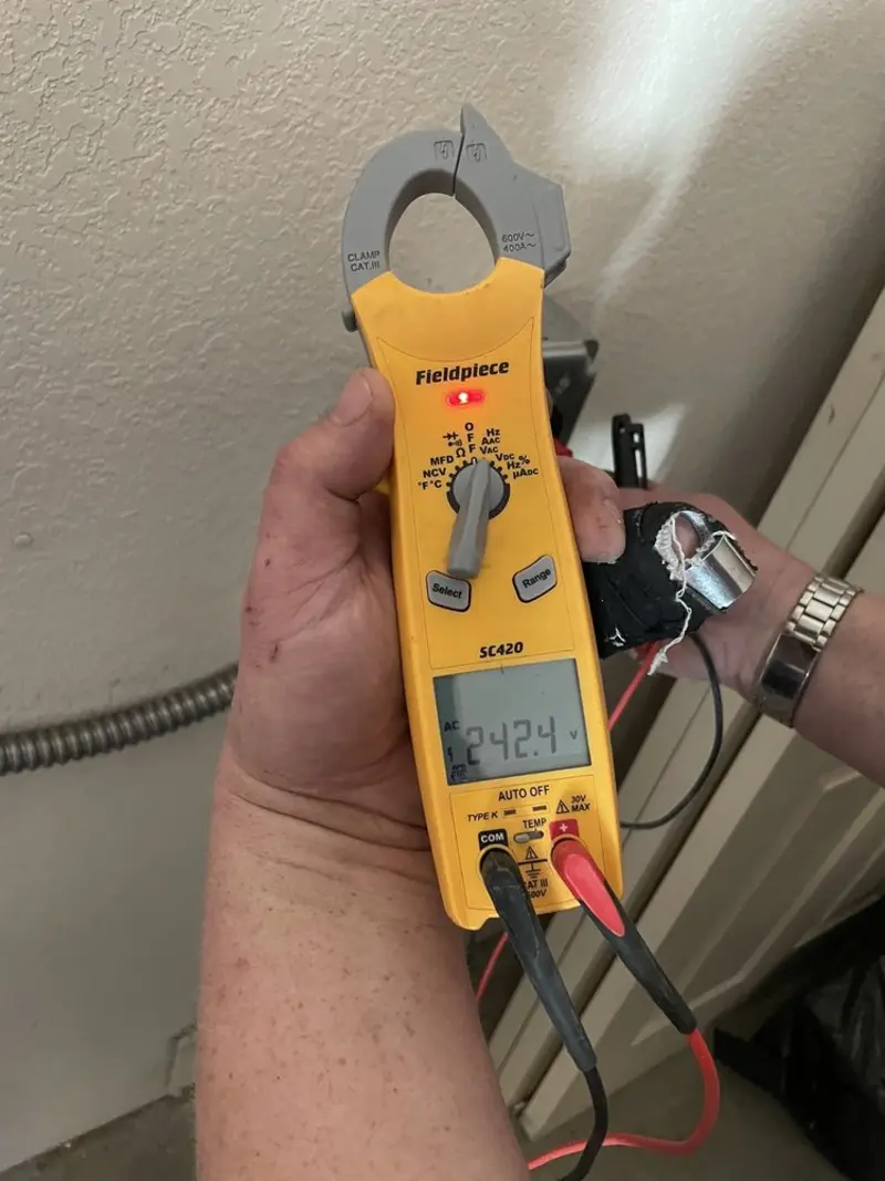 Voltage testing with clamp meter during Whole House Surge Protector in Shenango